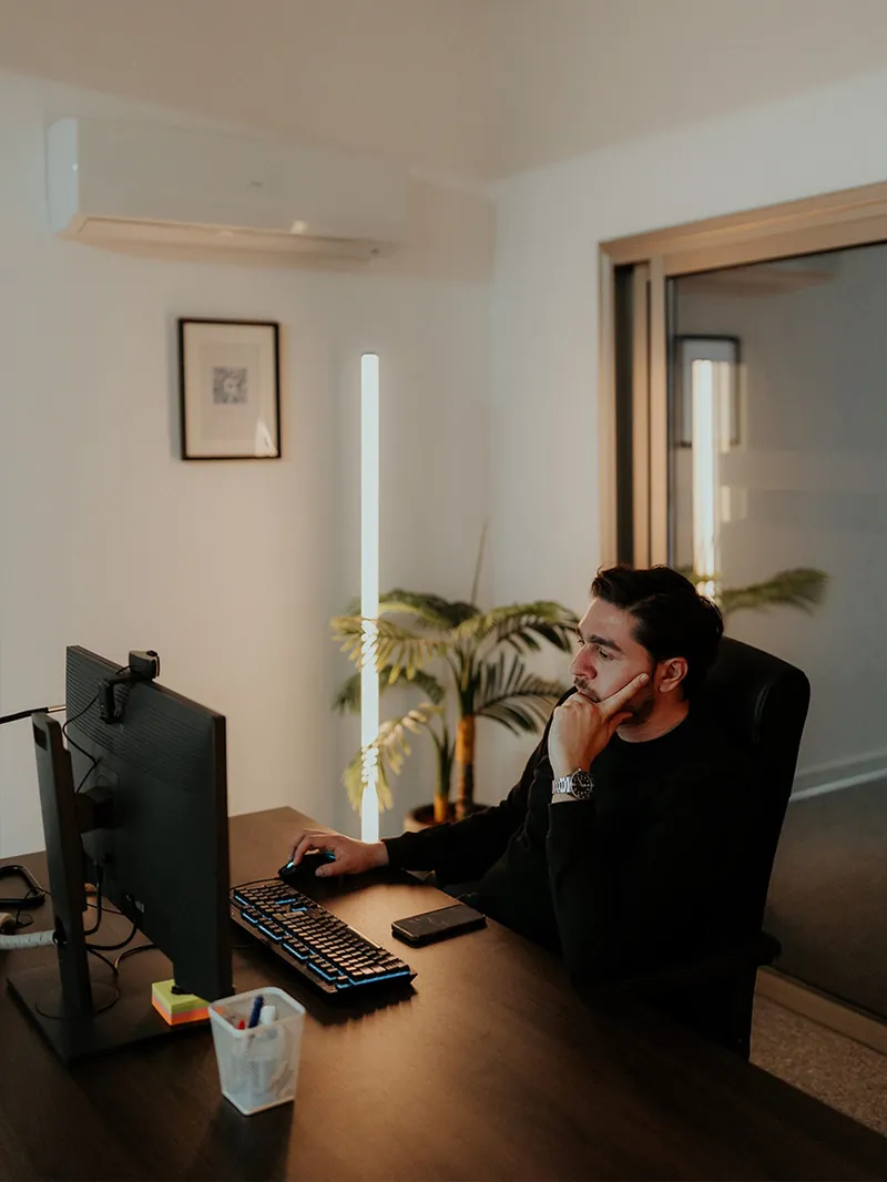 A member of The Obsidian Co. team working on campaign creative.