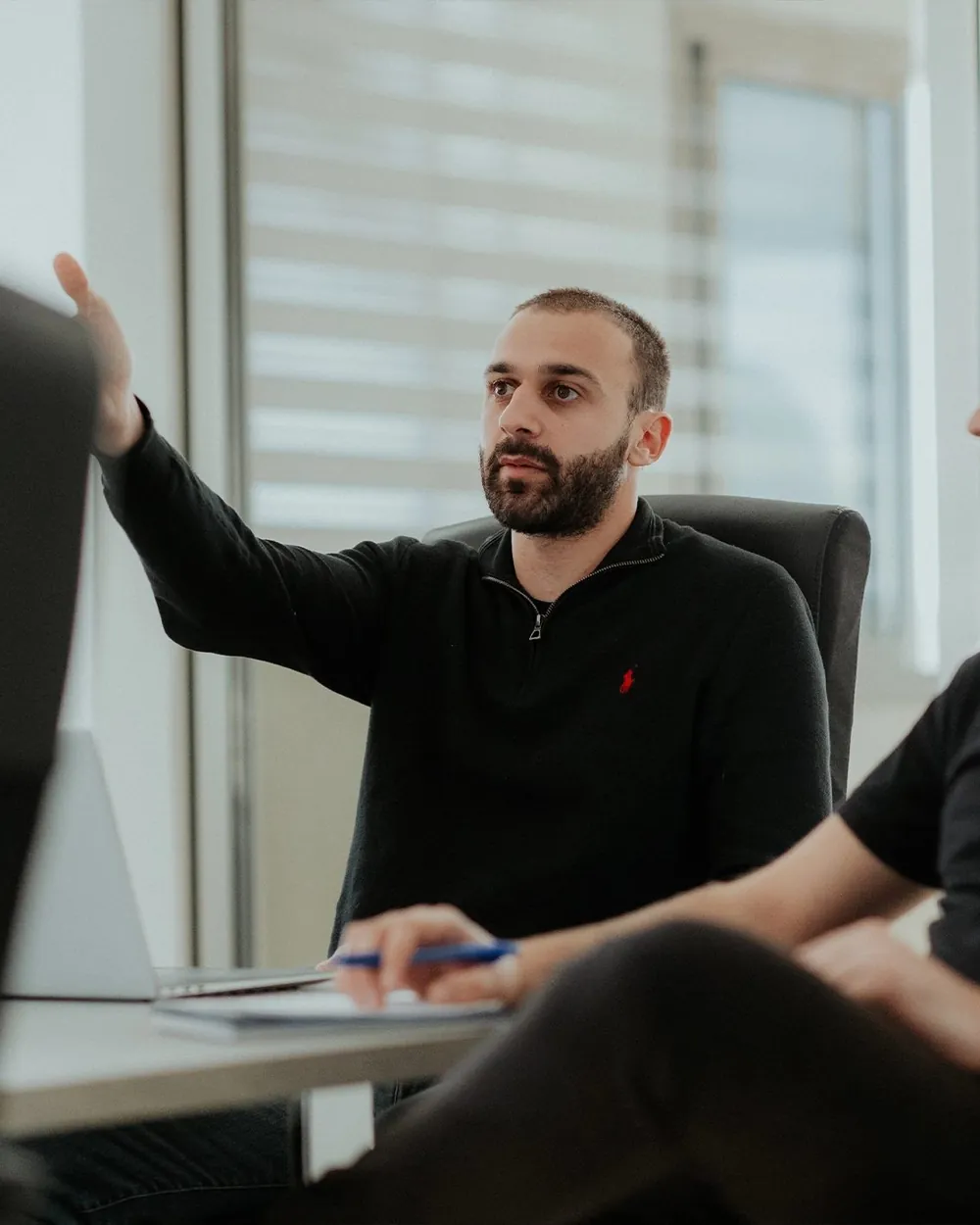 Two members of The Obsidian Co. team reviewing an ecommerce account together.